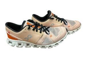 On cloud X3 women’s running shoes size 8 in peach rose / sand color. 60-98691